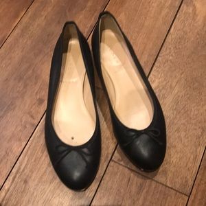 Black leather JC tee flats